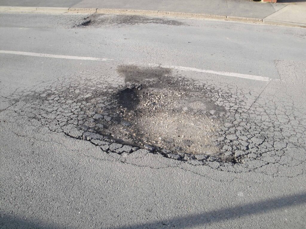 Chicago Potholes: 108,000 Filled this Winter, but Risk of Injury Remains