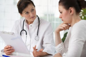 doctor-talking-to-female-patient
